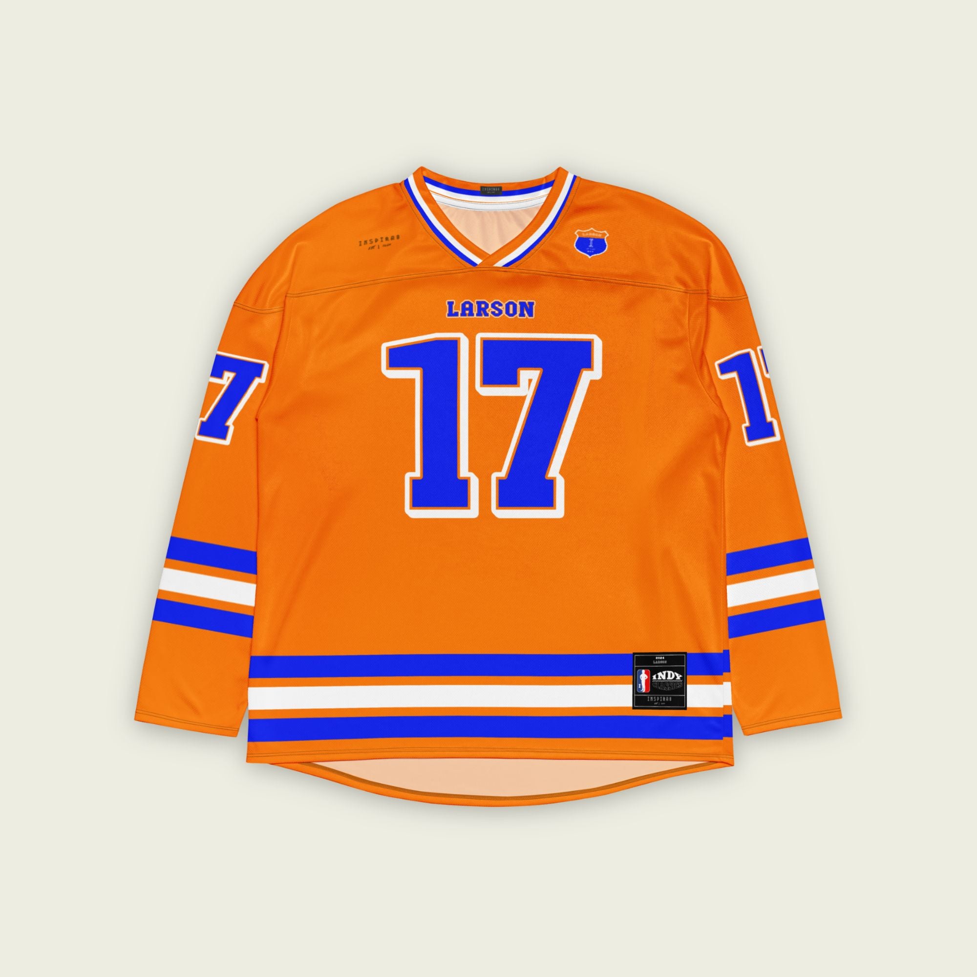 A orange and blye hockey jersey with Kyle Larson's indycar racing number 17 in blue with a white outline. The name larson is also on the front and back.