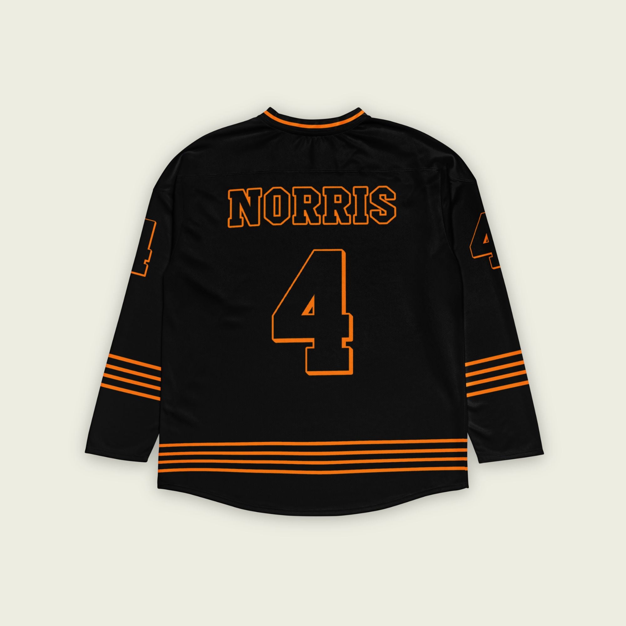 A black and papaya orange hockey jersey with orange stripes at the bottom, and Lando Norris's F1 racing number 4 on the front and back.