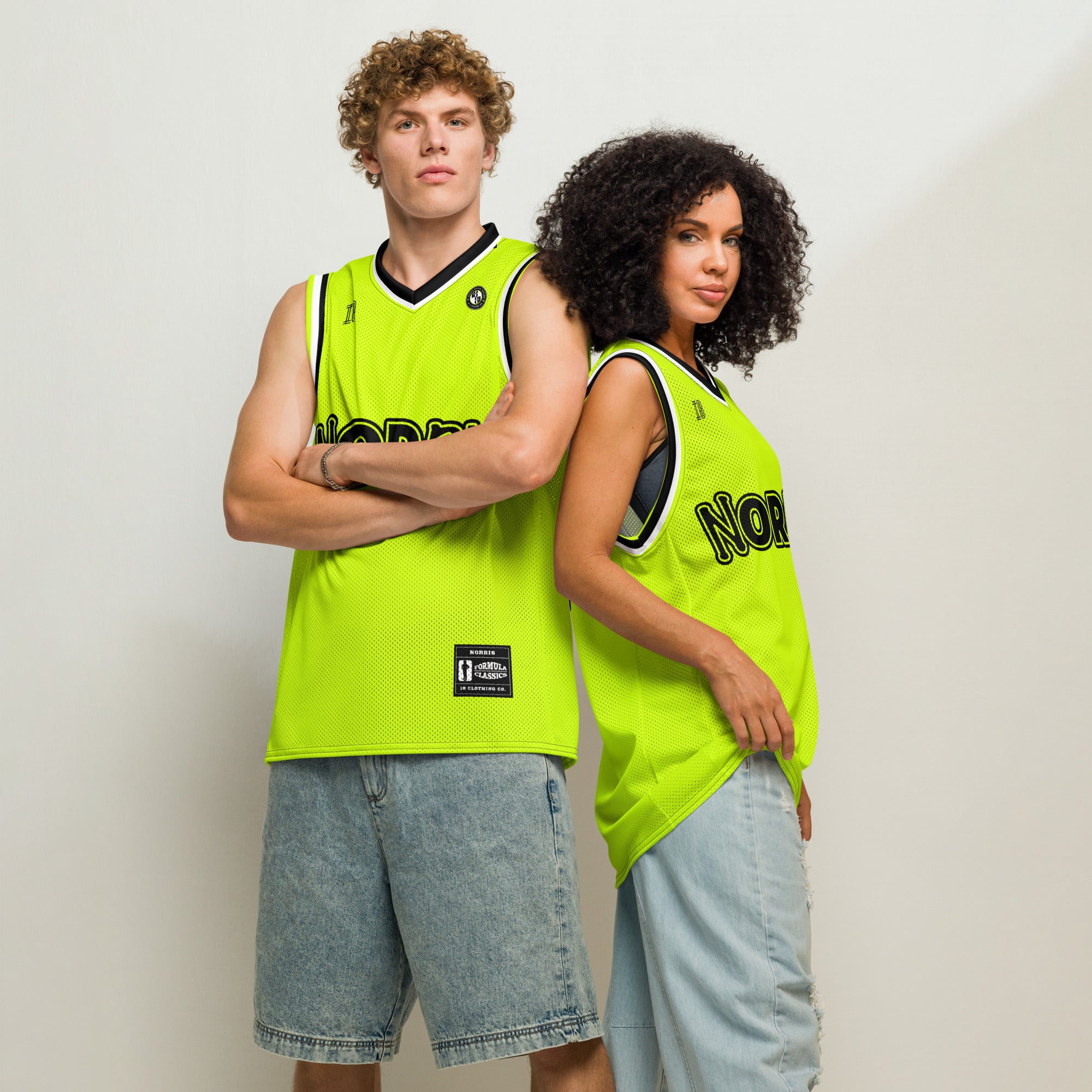 A neon green and black basketball Jersey with Lando Norris's McLaren F1 racing number 4 in balc and white on the back.