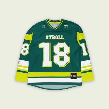 A british green hockey jersey with Lance Stroll's Aston Martin F1 racing number 18 in white on the front and back. It has the name Stroll on the back and front in white as well.