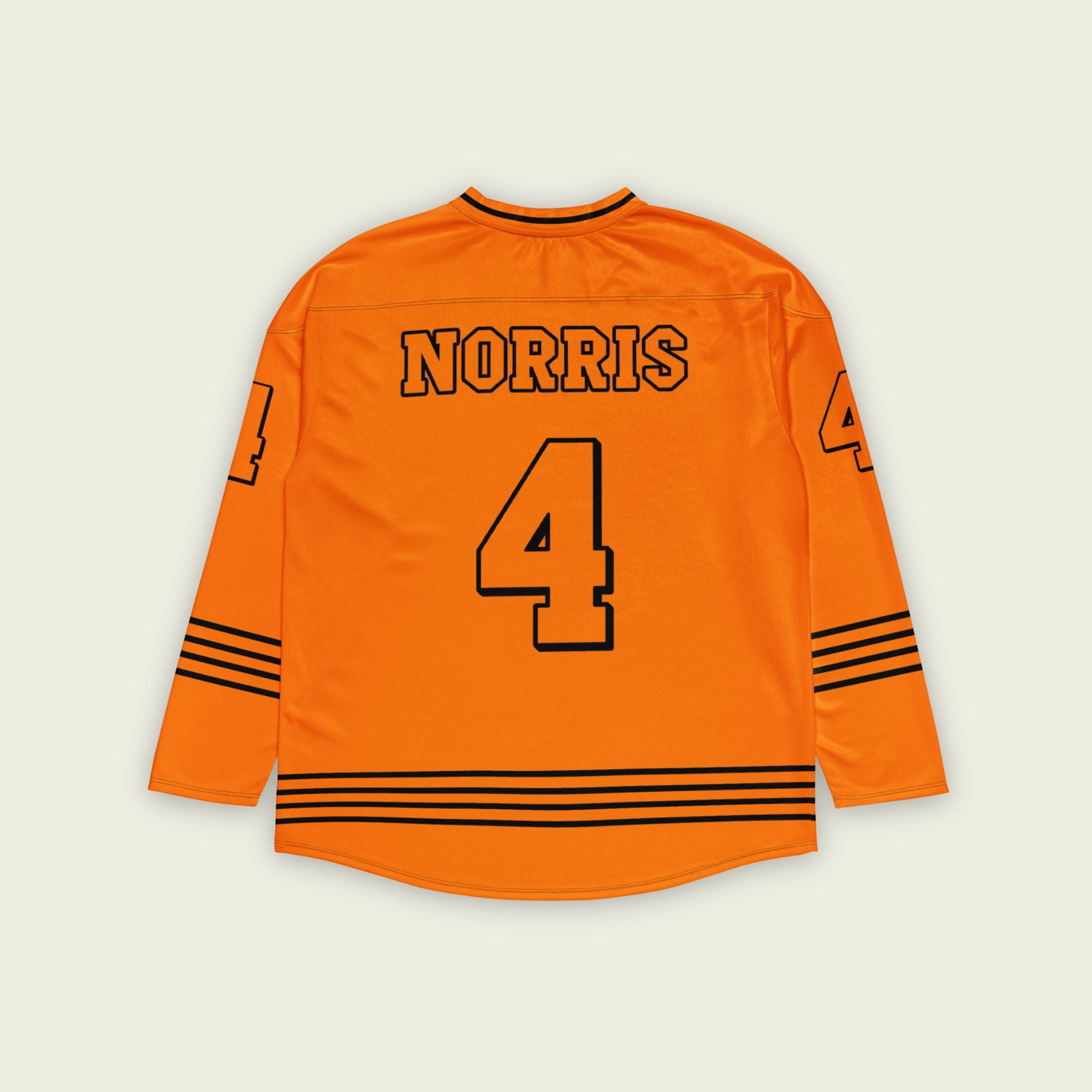 A black and papaya orange hockey jersey with orange stripes at the bottom, and Lando Norris's F1 racing number 4 on the front and back.