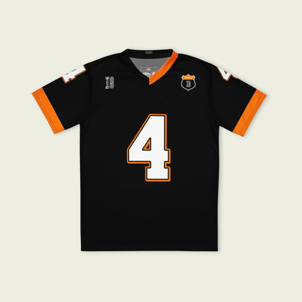 A black and papaya orange football jersey with Lando Norris's McLaren F1 racing number 4 on the back and front in white. It has the name Norris in orange on the front as well.