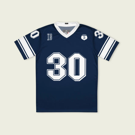 A navy blue and red football jersey with Liam Lawson's Redbull  F1 racing number 30 on the back and front in white. It has the name Lawson in white on the front and back as well.