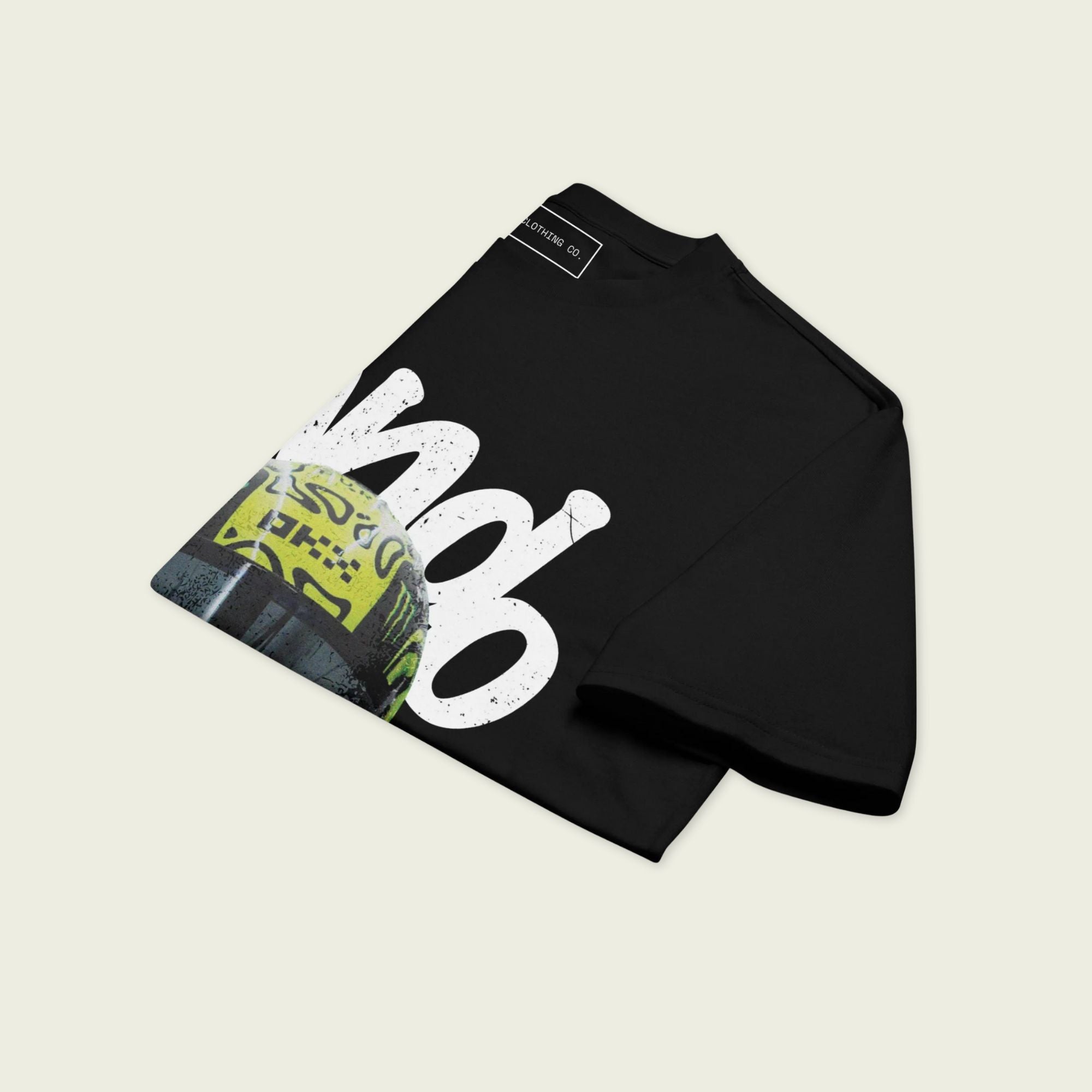 A black oversized TShirt with white text Lando on the front  and lando norris's neon green helmut on the front.
