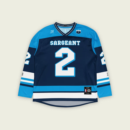 A blue hockey jersey with Logan Sargeant's Williams racing number 2 on the front and back in white, also the name Sargeant on the back and front in White