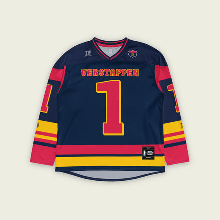 A navy blue hockey jersey with Max Verstappen's F1 racing number 1 in red on the front and back. It has the name Verstappen on the back and front in red as well.