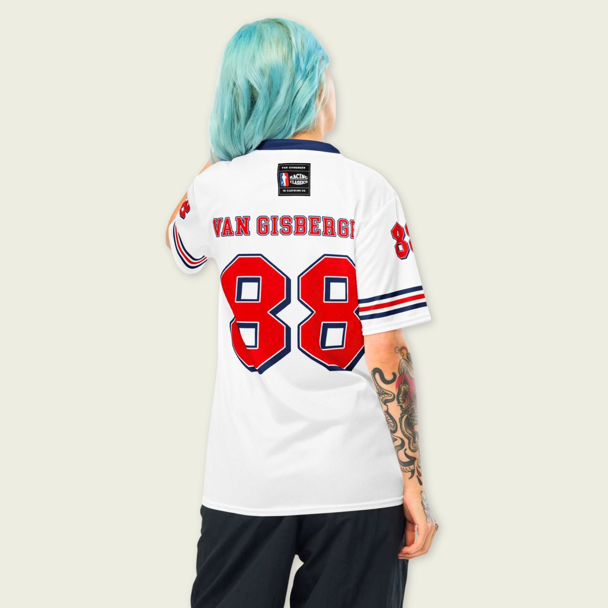 Person wearing a white sports jersey with red and blue details, featuring the name 'Van Gisbergen' and number '88'.