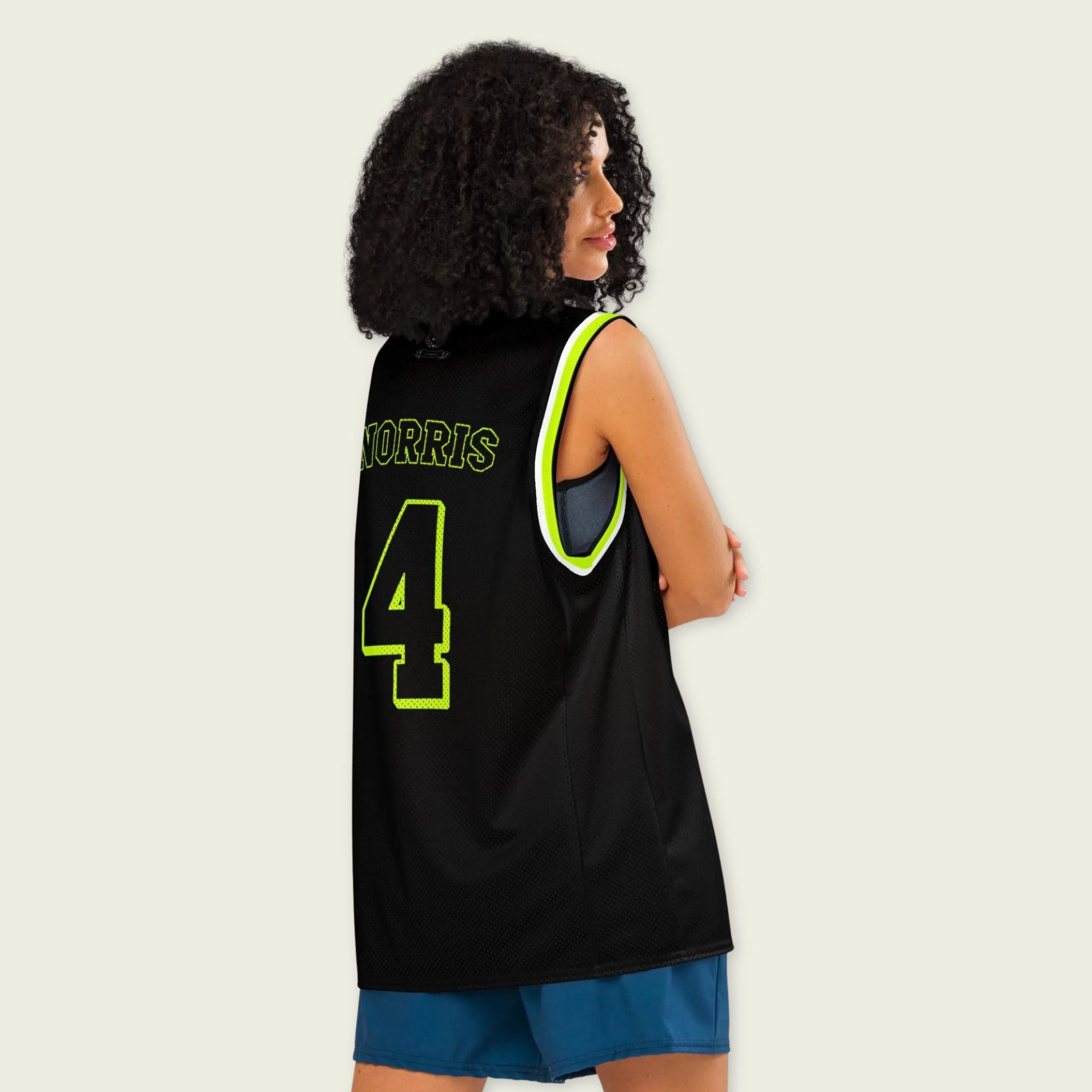 Person wearing a black sports jersey with 'Morris' and number '4' on a plain background