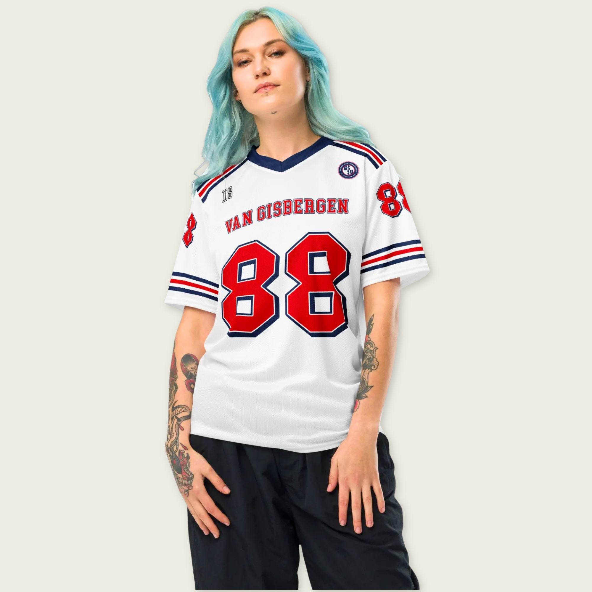 Person wearing a white sports jersey with red and blue details on a plain background
