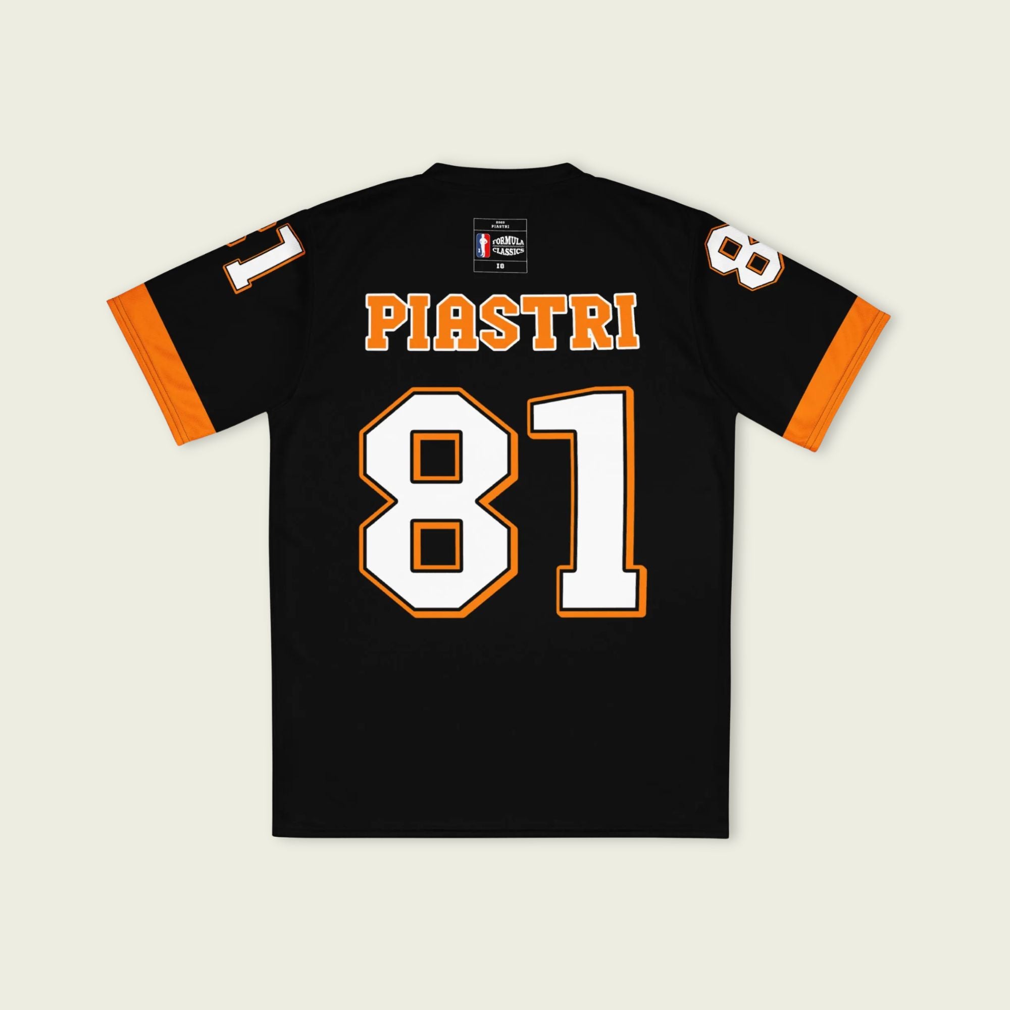 A black and papaya orange football jersey with Oscar Piastri's McLaren F1 racing number 81 on the back and front in white. It has the name Piastri in orange on the front as well.