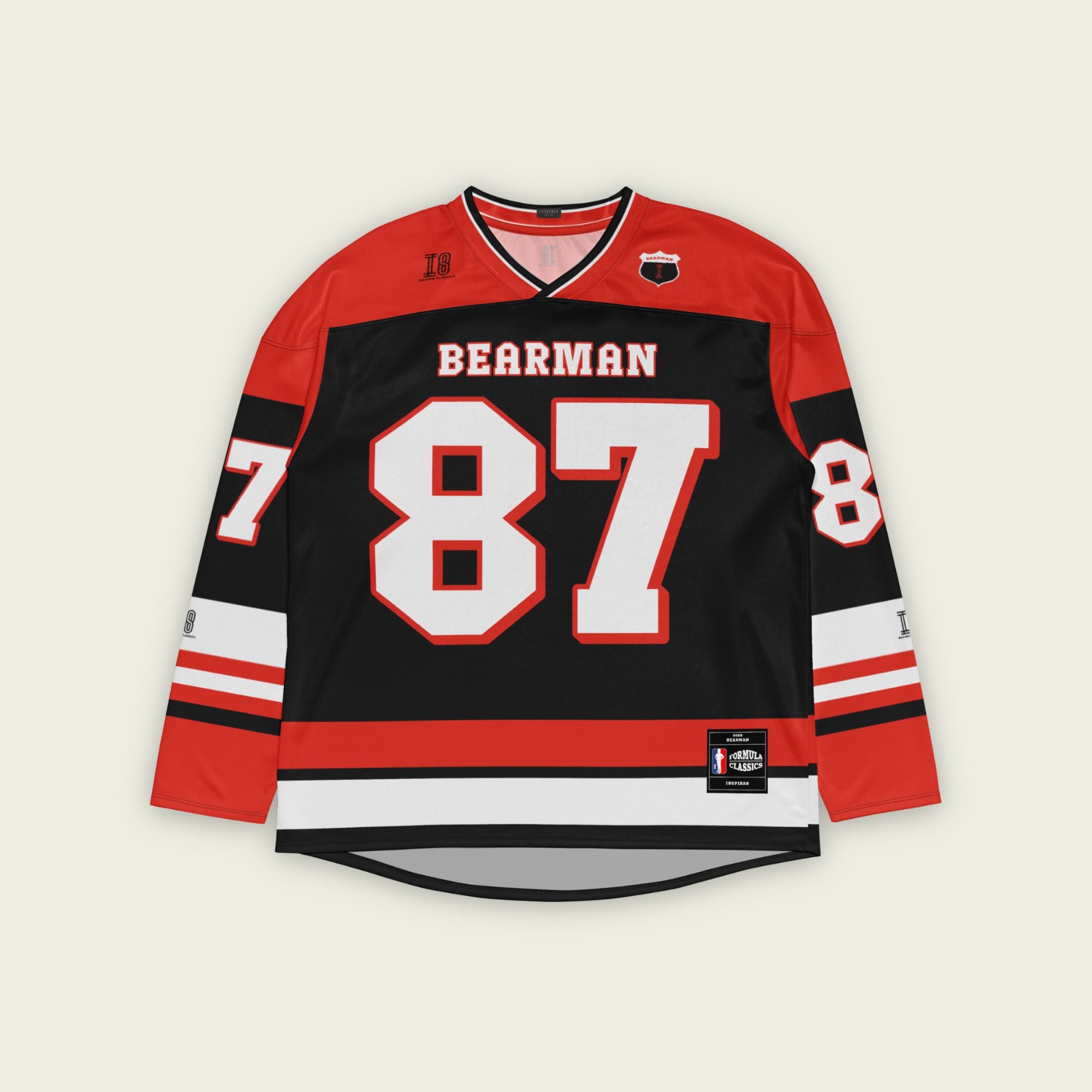 A red and black hockey jersey with Oliver Bearman's Haas F1 racing number 87 on the front and back in white, also the name Bearman is on the back and front in White.