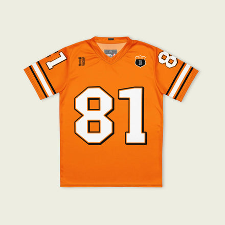 A papaya orange football jersey with Oscar Piastris McLaren  F1 Racing number 81 on the front and back.