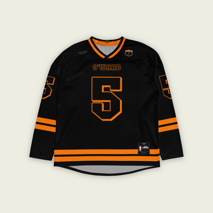 A black hockey jersey with Pato Owards name and indycar racing number 5 on the front and back in orange.