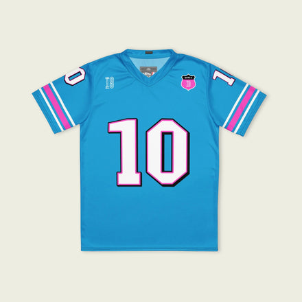 A blue and pink football jersey with Pierre Gasly' s Alpine F1 Racing number 10 on the front and back in white with a pink and black outline.