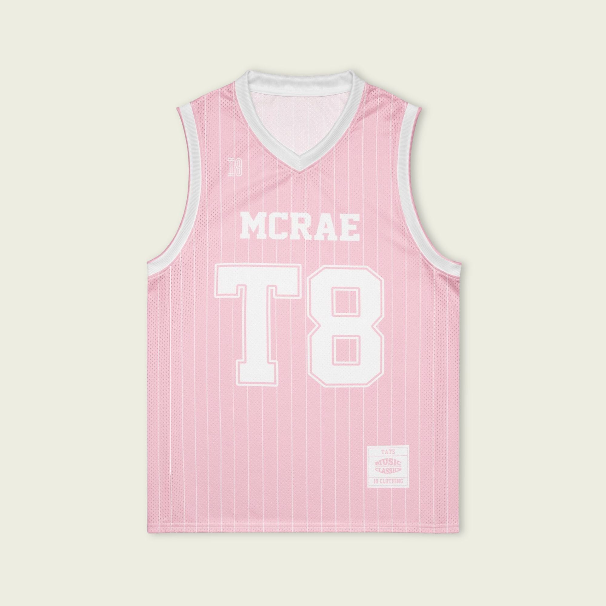 A pink and white pin striped basketball Jersey with T8 Tate Mcrae on the front and pink and white.