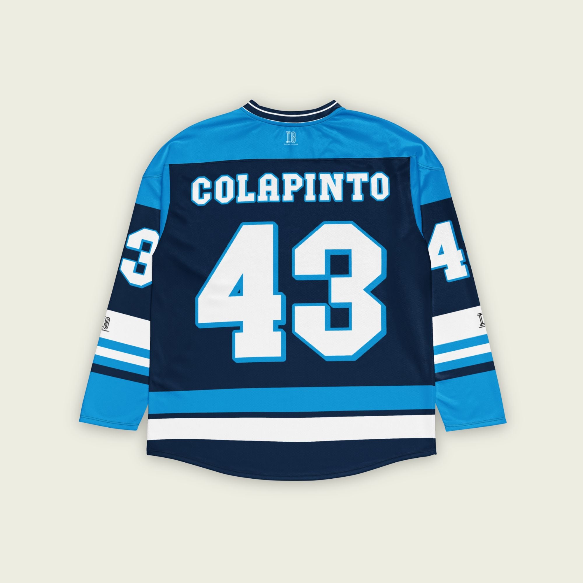 A navy blue hockey jersey with Franco Colapinto's Williams F1 Racing number 42 in white on the front and back.