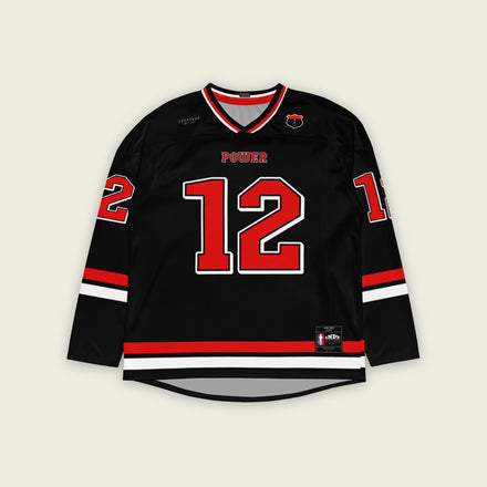 A black hockey jersey with Will Power's indycar racing number 12 on the front and back in red, also the name Power is on the back and front in red.