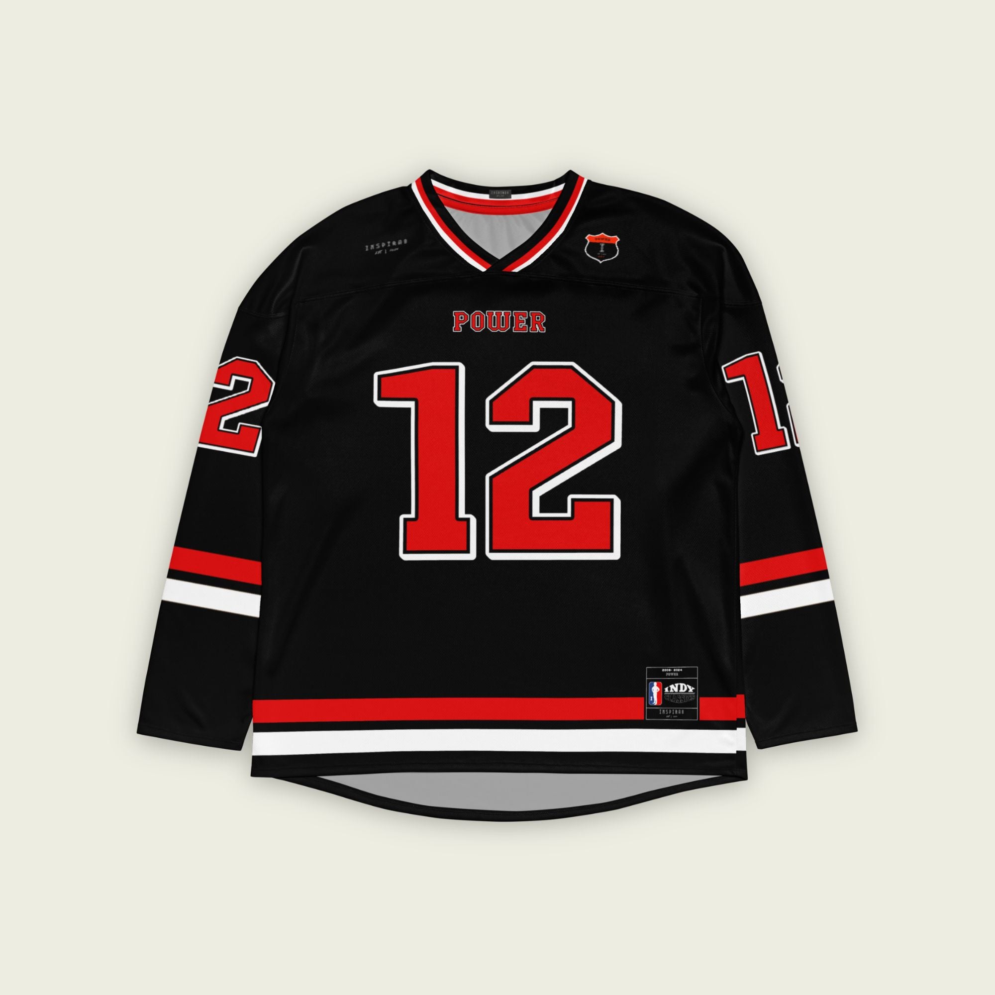 A black hockey jersey with Will Power's indycar racing number 12 on the front and back in red, also the name Power is on the back and front in red.