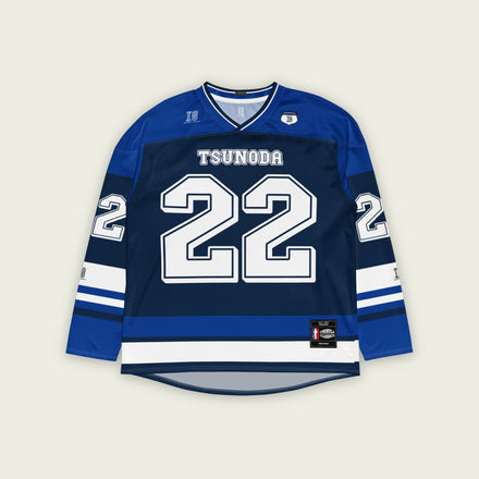 A navy blue hockey jersey with Yuki Tsunoda VCARB F1 racing number 22 in white on the front and back. It has the name Tsunoda on the back and front in white as well.