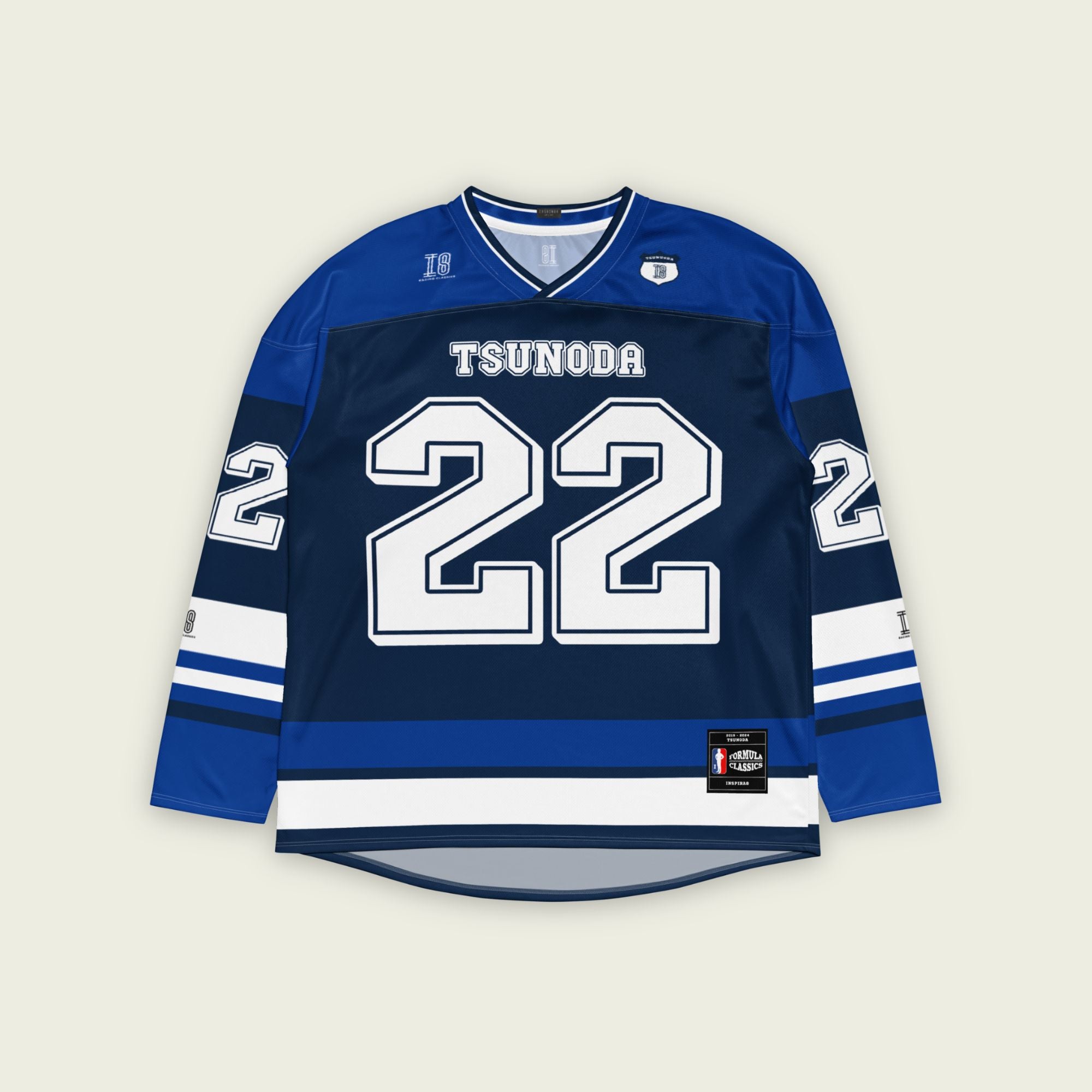 A navy blue hockey jersey with Yuki Tsunoda VCARB F1 racing number 22 in white on the front and back. It has the name Tsunoda on the back and front in white as well.