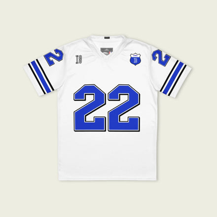 A white and blue football jersey with Yuki Tsunoda's Redbull F1 Racing number 22 on the front and back.