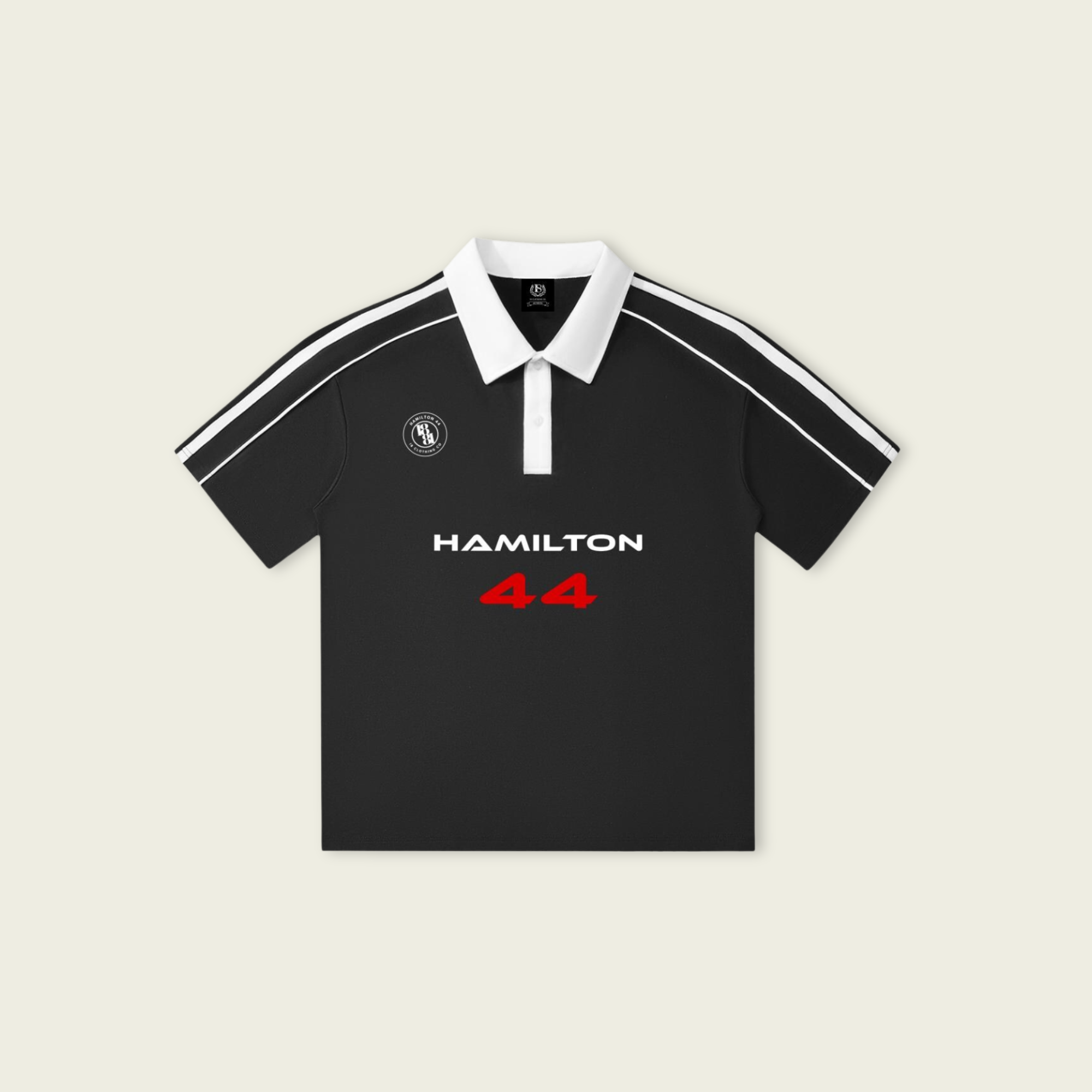Black polo shirt with 'Hamilton 44' on a beige background