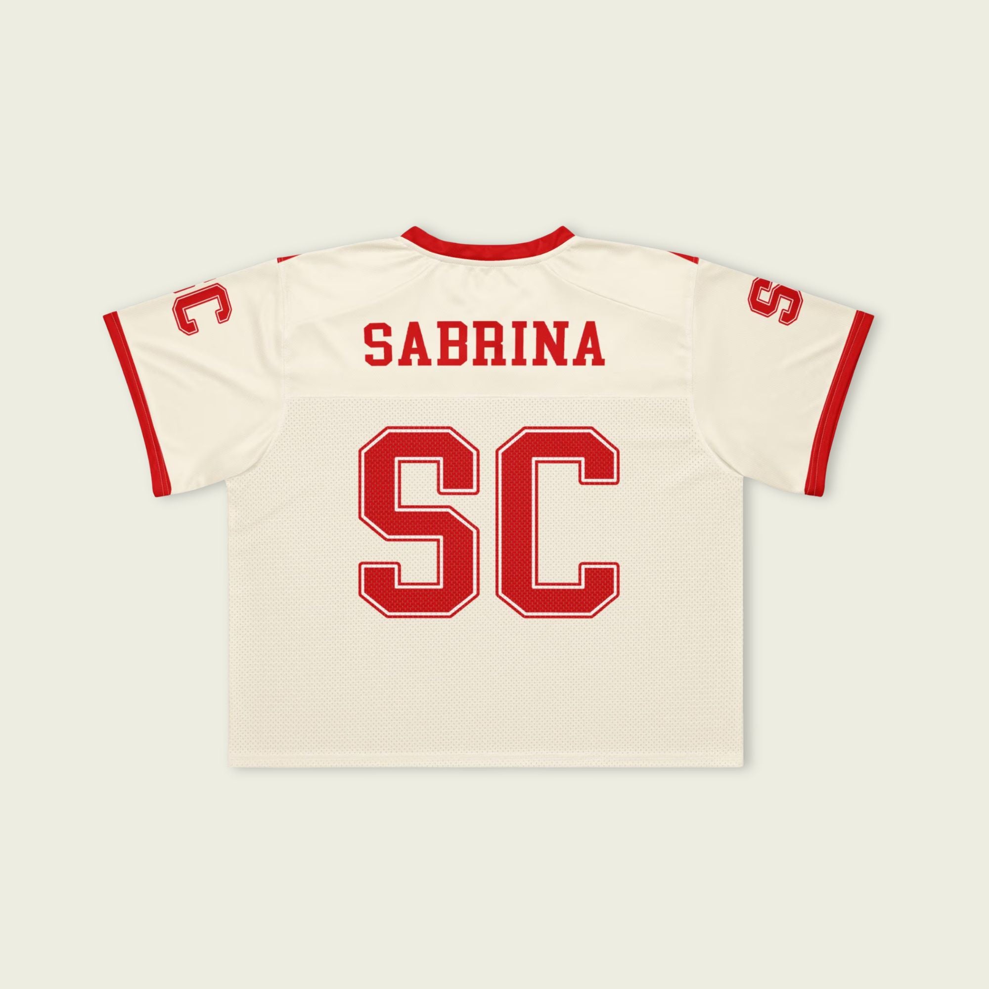 Baseball jersey with 'Sabrina' and 'SC' printed on a beige background