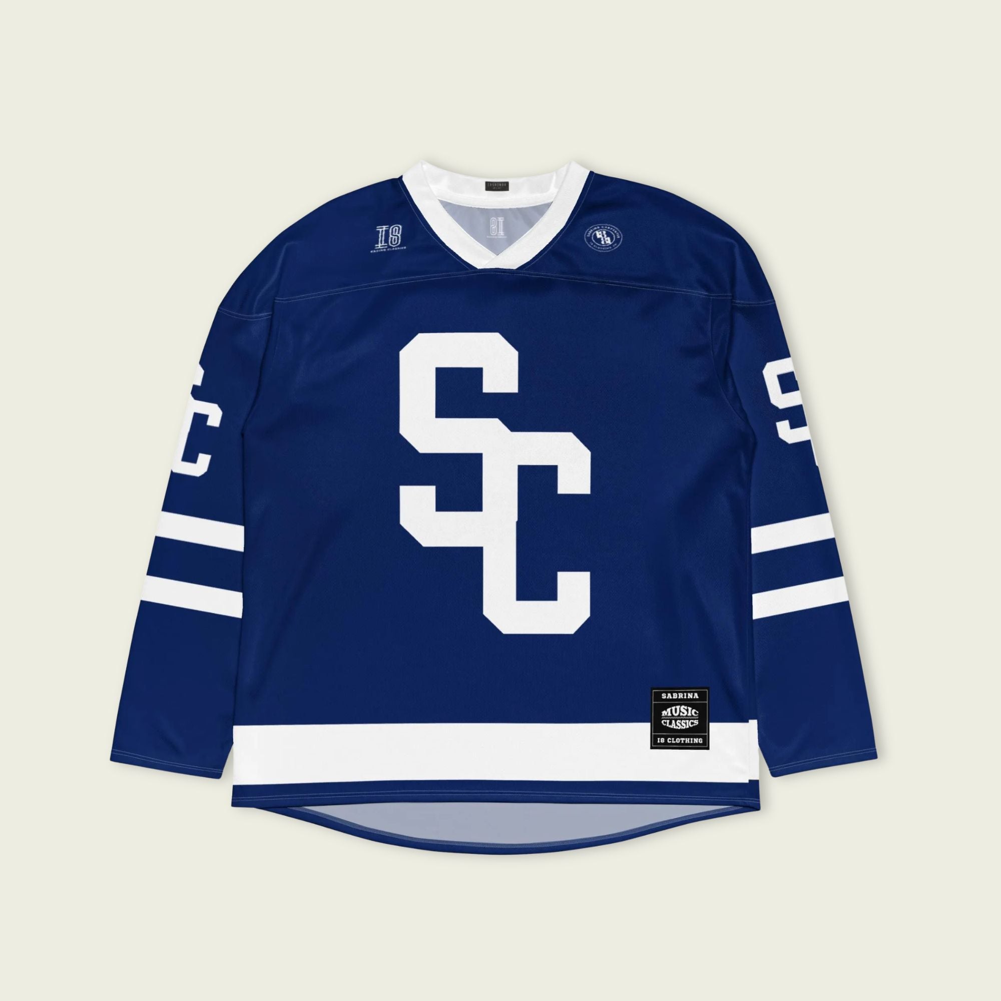 Blue sports jersey with white lettering on a light beige background