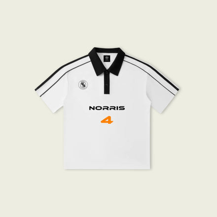 White polo shirt with black accents and 'Norris 4' branding on a light beige background