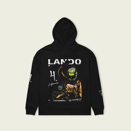 Black hoodie with a graphic of a person in a racing suit and 'LANDO' text on a beige background