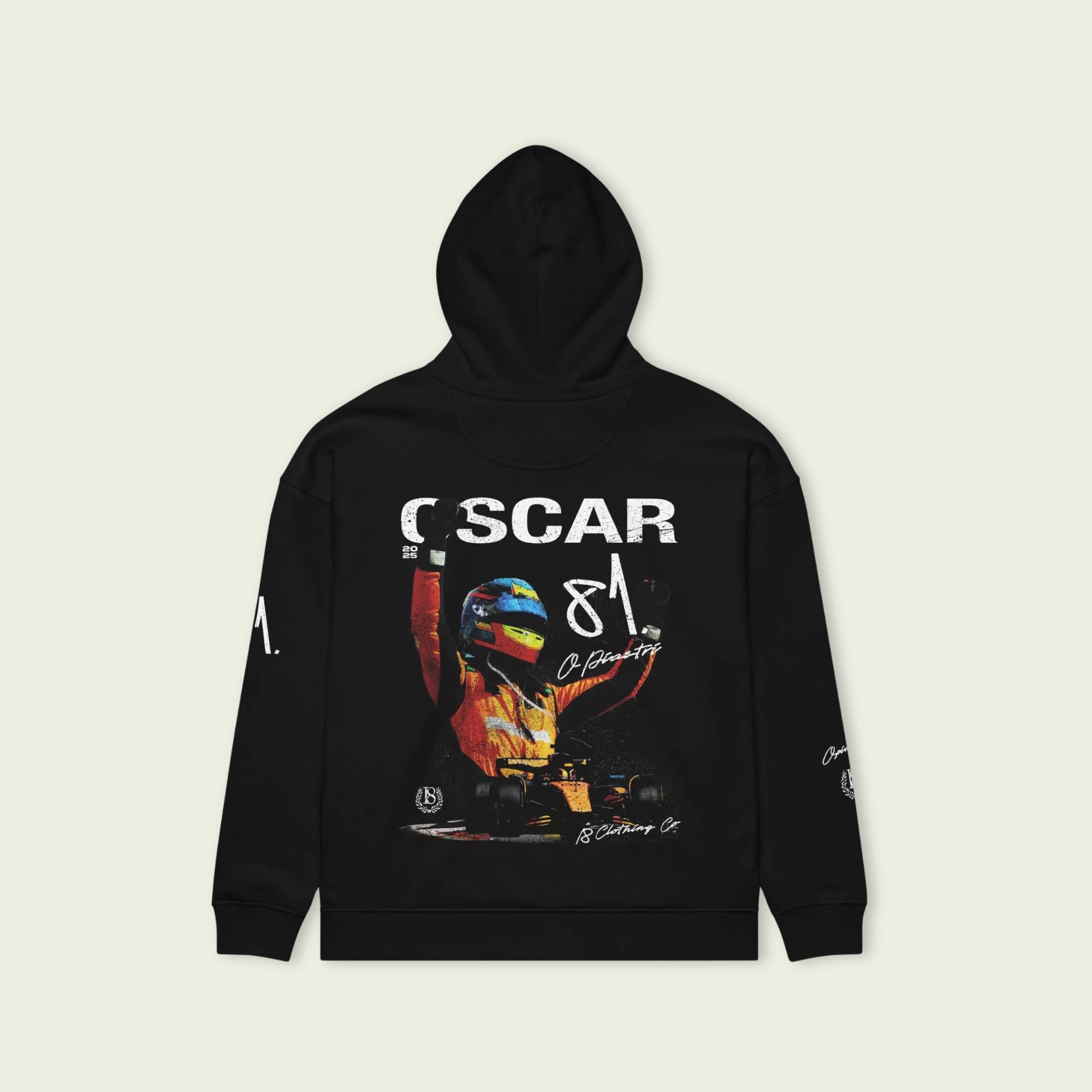 Black hoodie with a colorful graphic and text on a beige background