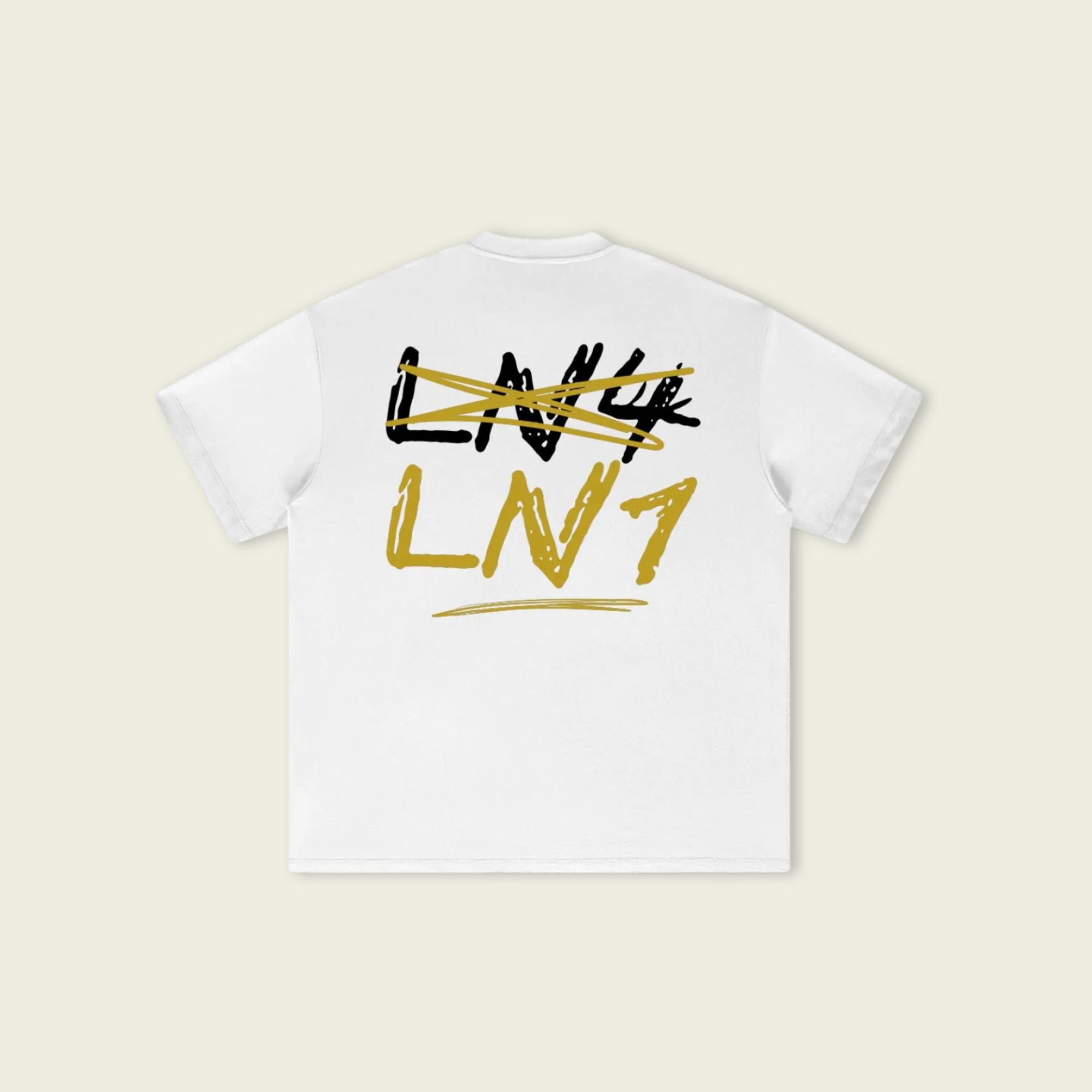 White t-shirt with black and gold text on a beige background