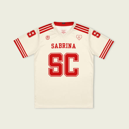 Beige sports jersey with red lettering and accents on a beige background