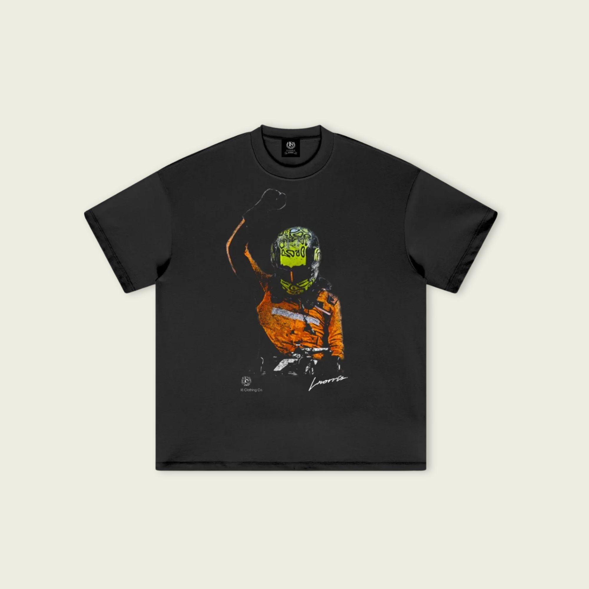 Black t-shirt with a graphic of a person in an orange suit and helmet on a beige background
