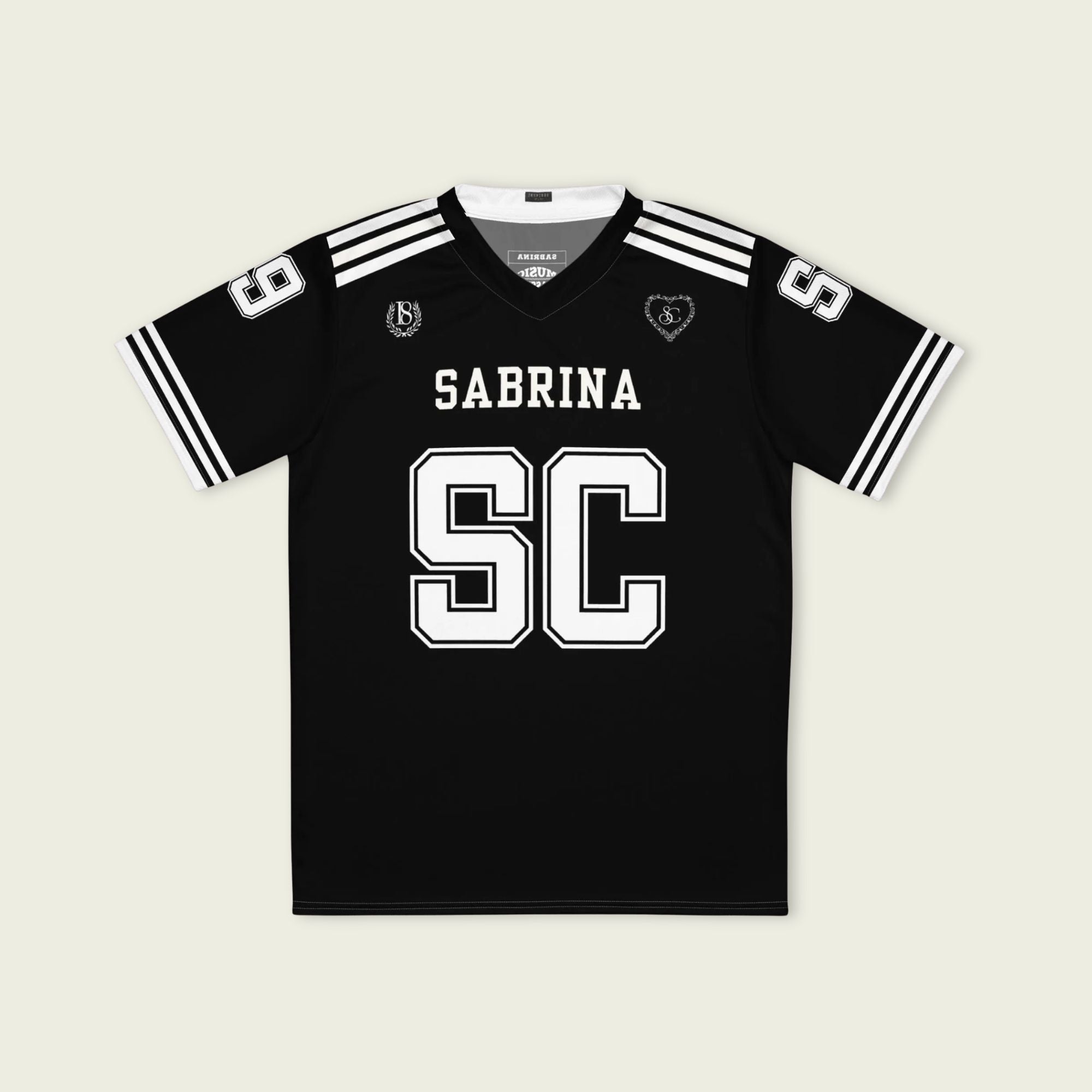 Black sports jersey with 'Sabrina SC' printed on a beige background