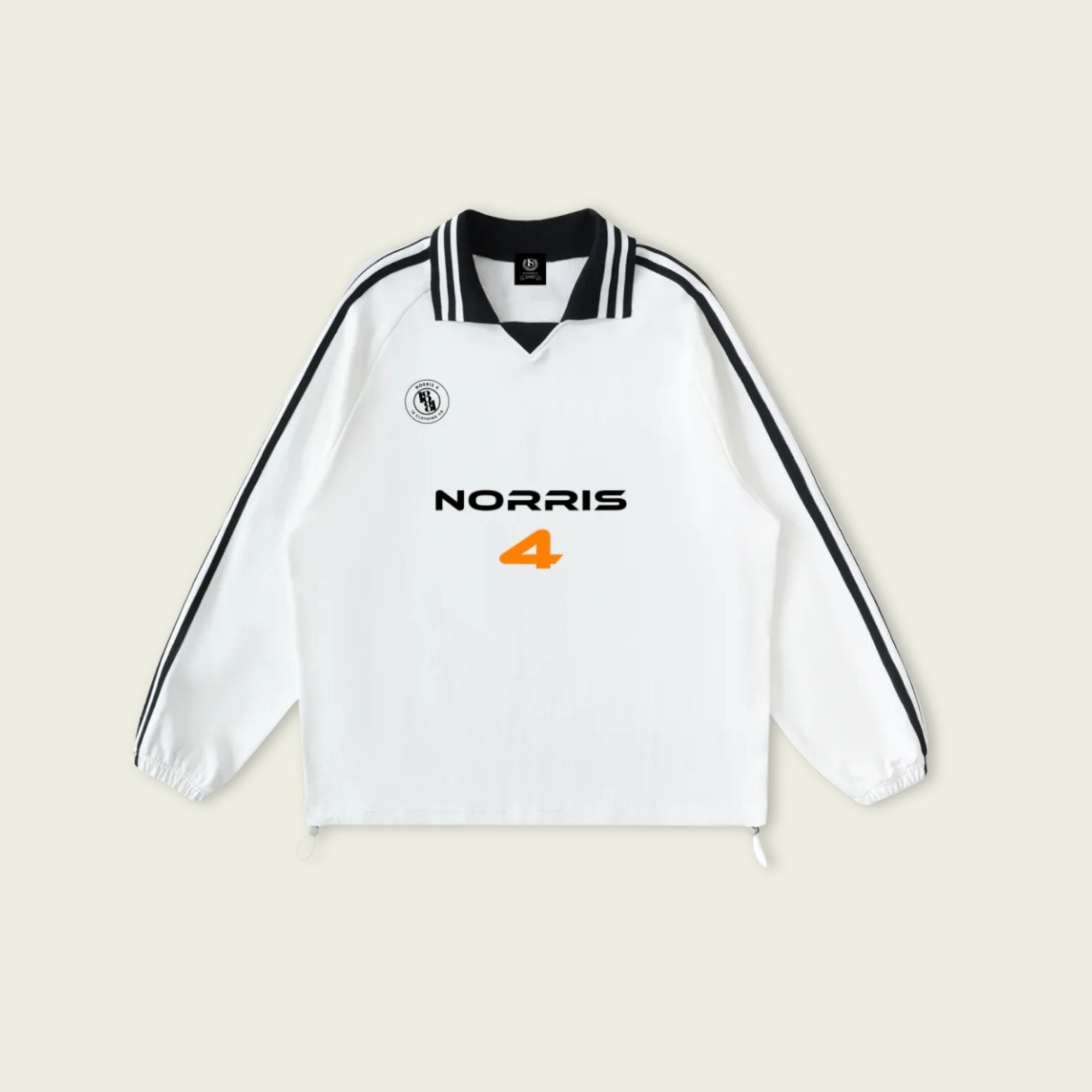 White long-sleeve shirt with 'Norris' and number '4' on a beige background
