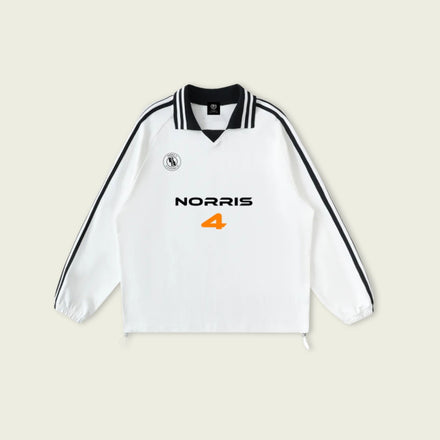 White long-sleeve shirt with 'Norris' and number '4' on a beige background