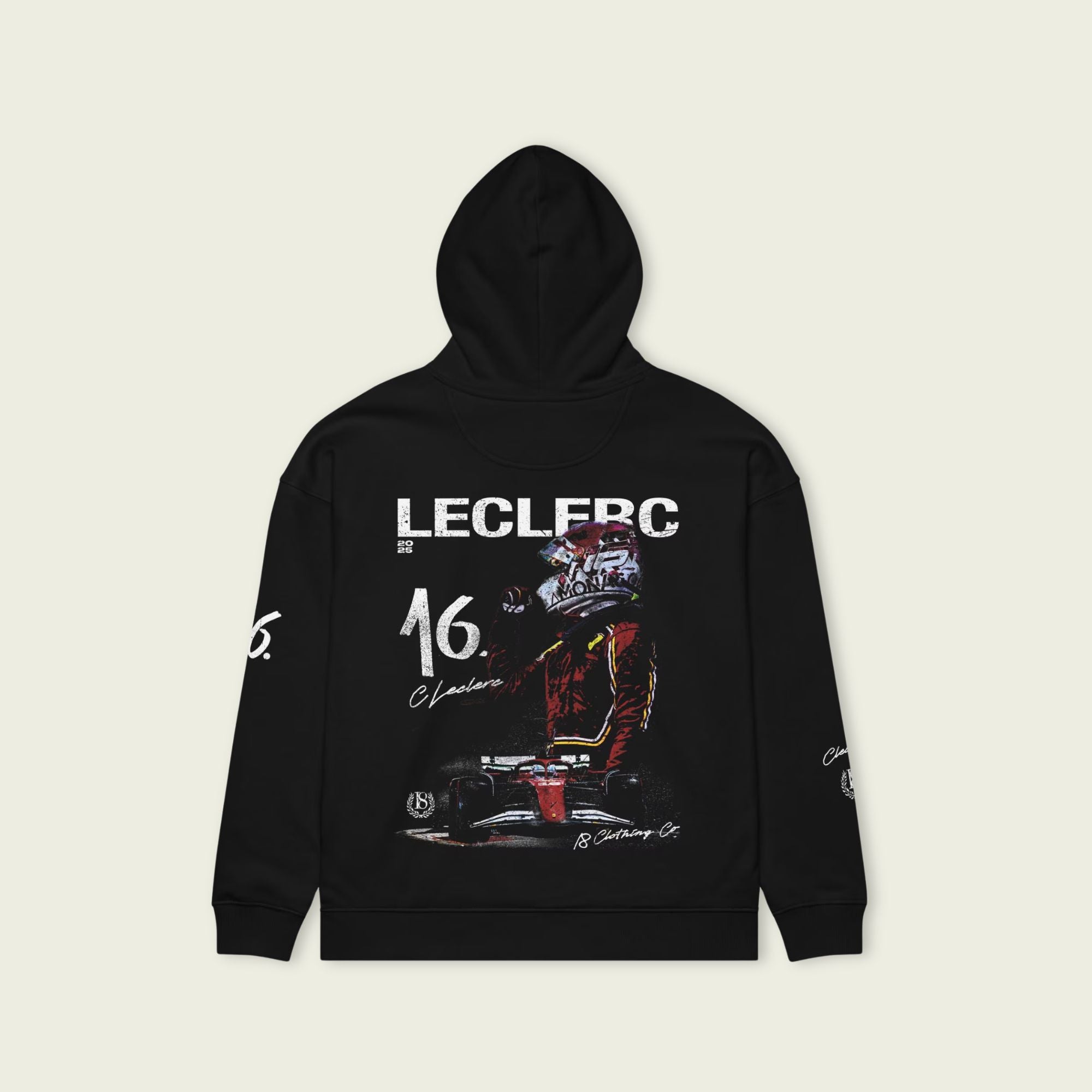 Black hoodie with Formula 1 car design and 'LECLERC' text on a beige background