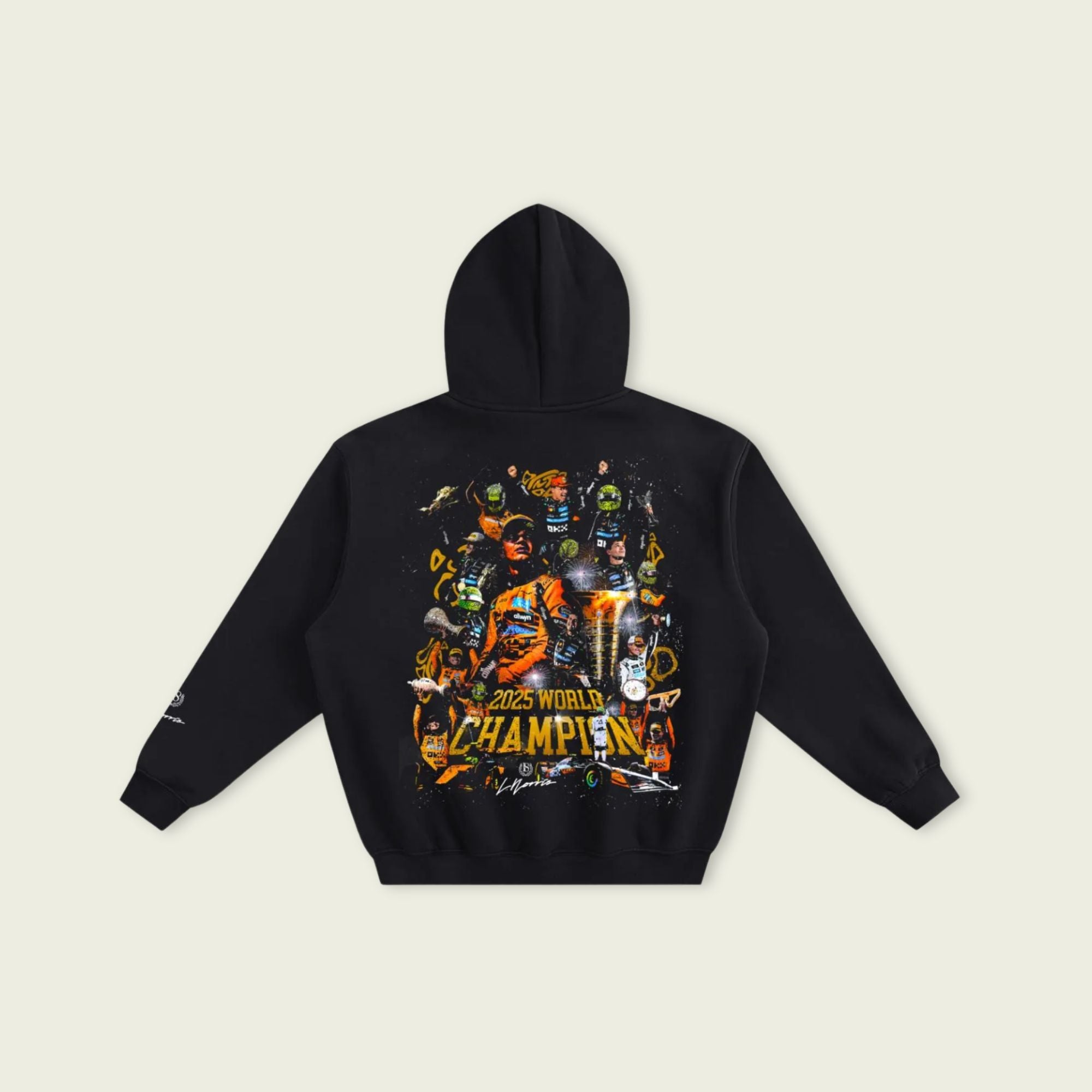 Black hoodie with colorful graphic design on a beige background