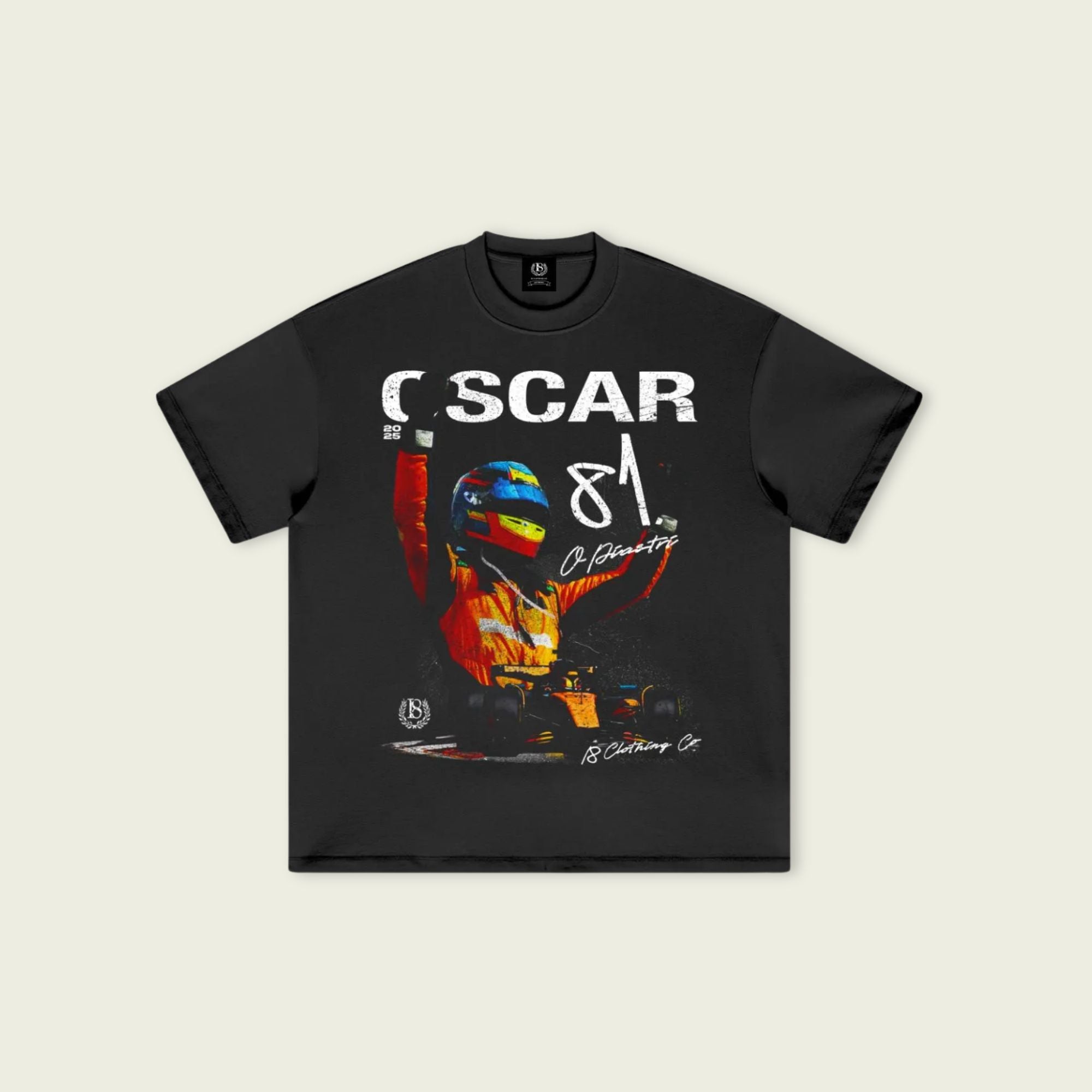 Black t-shirt with colorful graphic and 'Oscar 81' text on a beige background