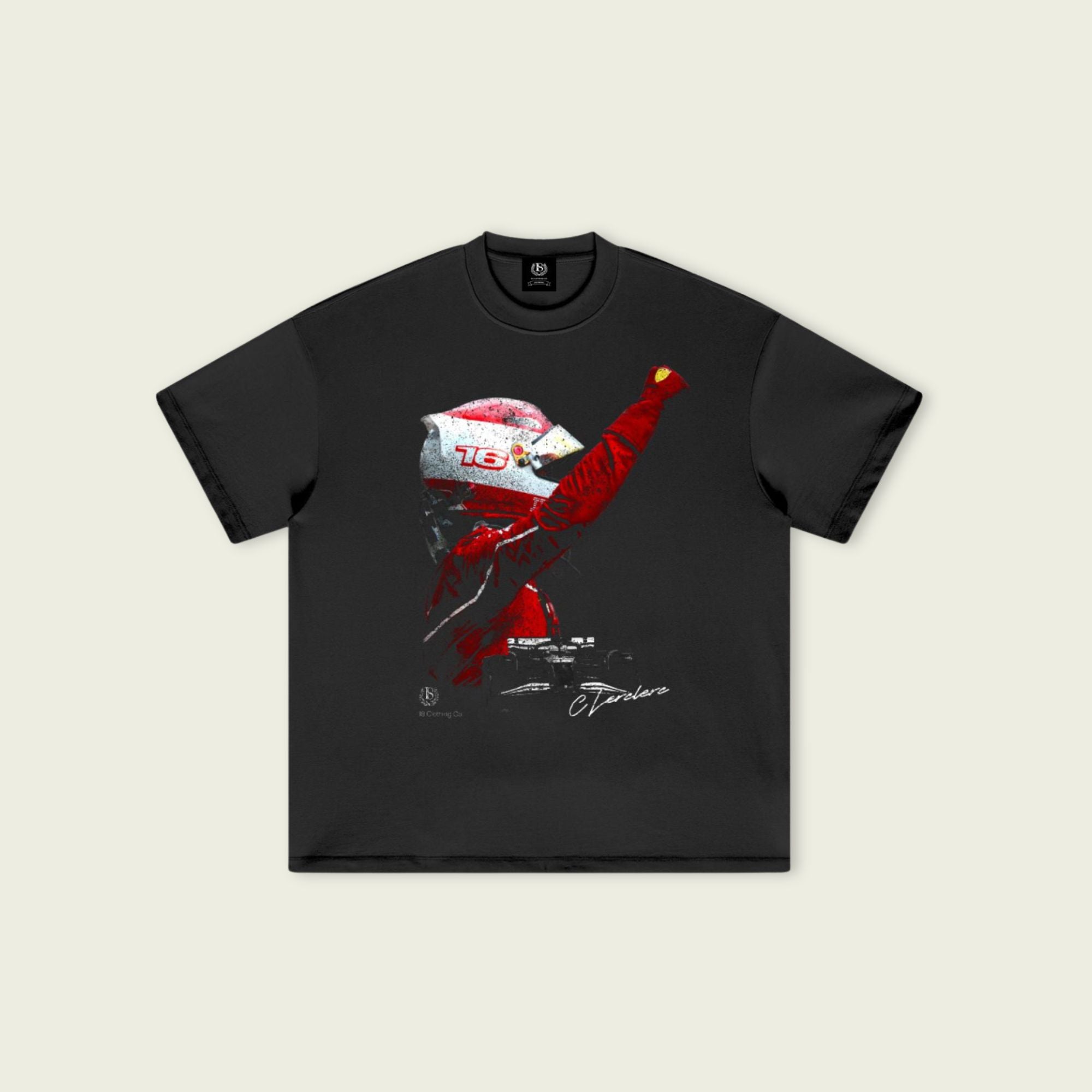 Black t-shirt with a graphic design on a beige background