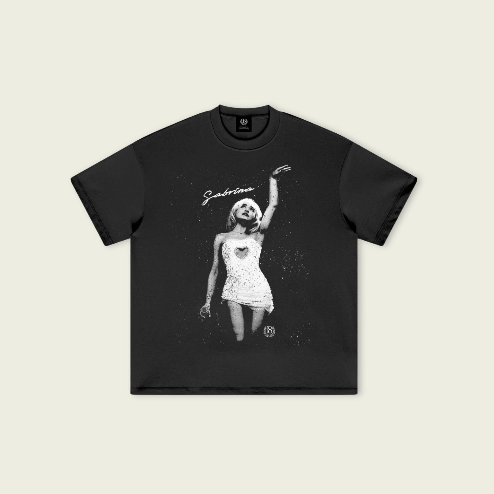 Black t-shirt with a graphic design of a woman in a dress on a beige background