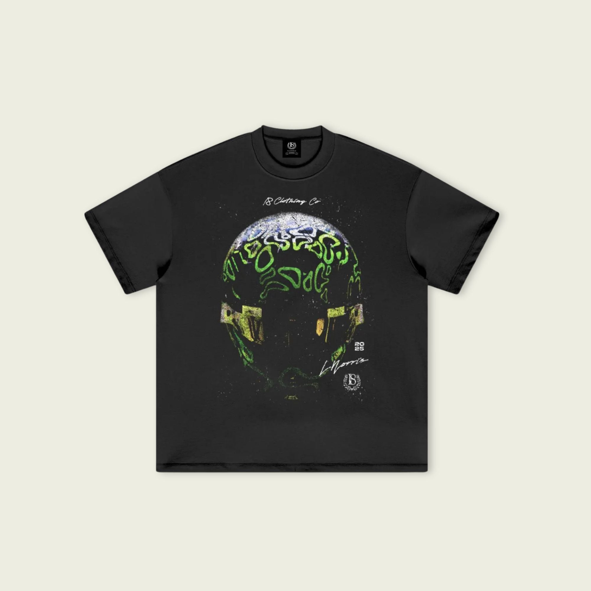 Black t-shirt with a colorful graphic design on a beige background