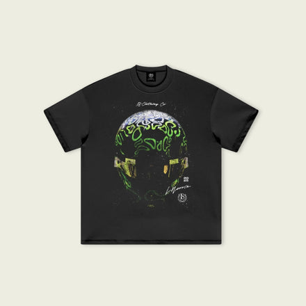Black t-shirt with a colorful graphic design on a beige background