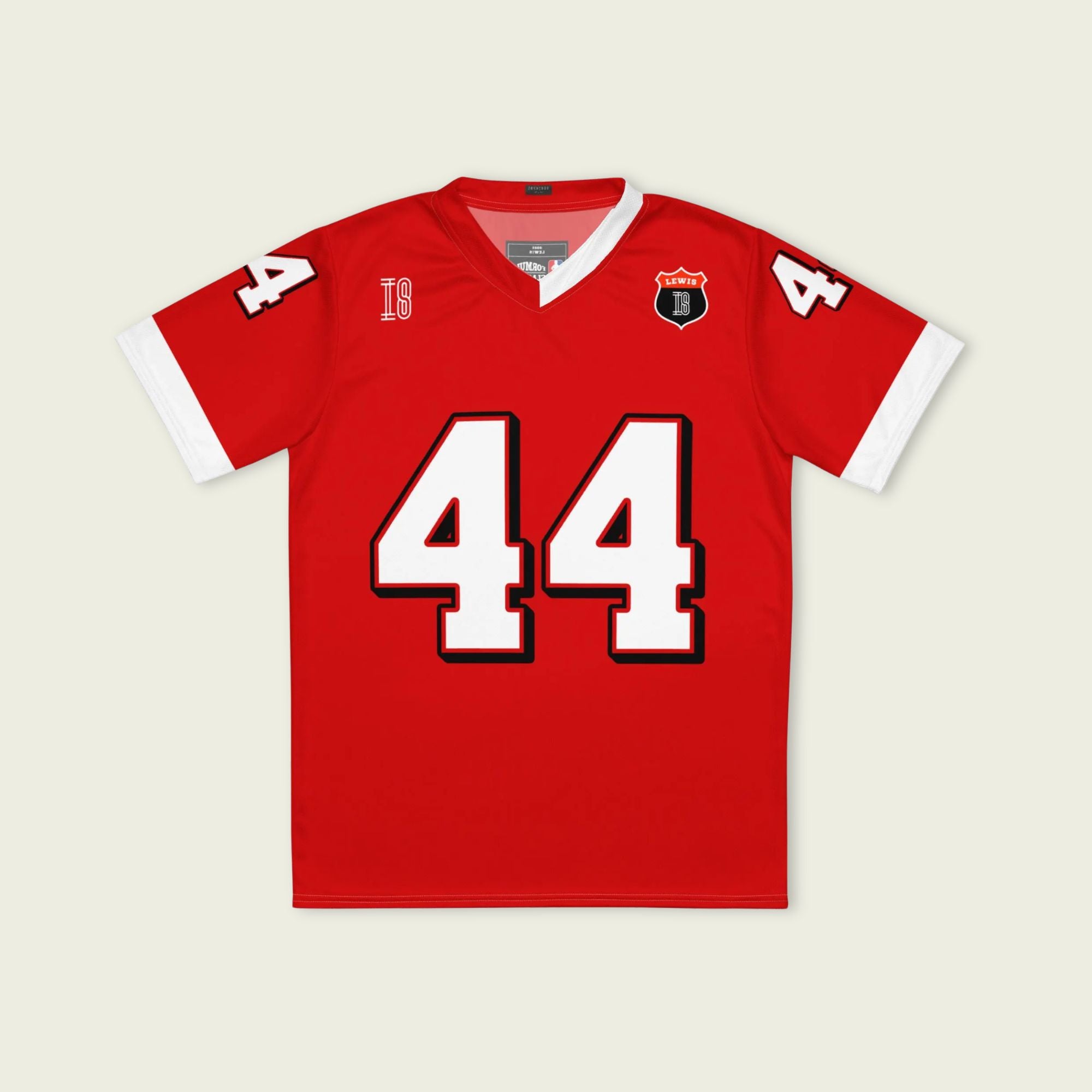 A red and white football jersey with Lewis Hamilton's Ferrari  F1 racing number 44 on the back and front in white. It has the name Hamilton in red on the front and back as well.