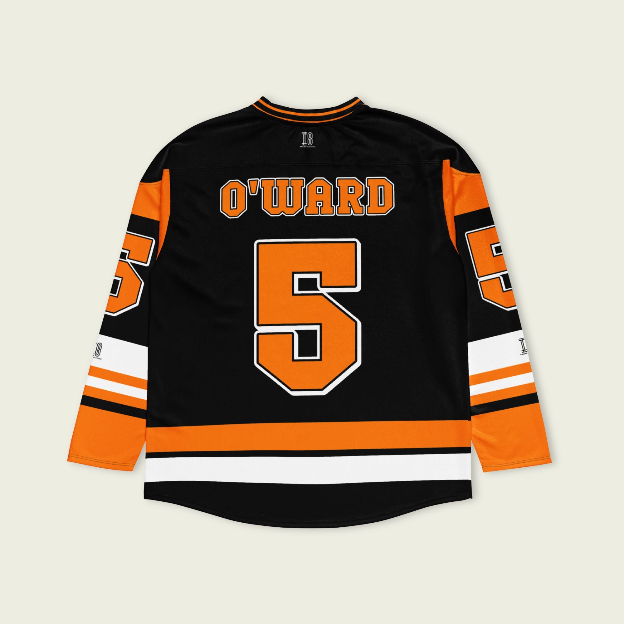 A black hockey jersey with Pato O'Ward's name and indycar racing number 5 on the front and back in orange.